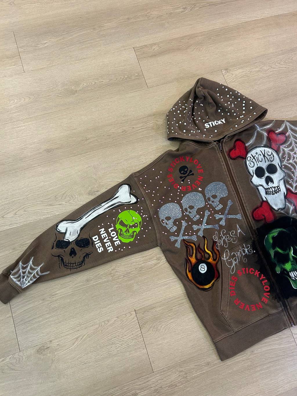 Sticky “Life’s A Gamble” Zip Up