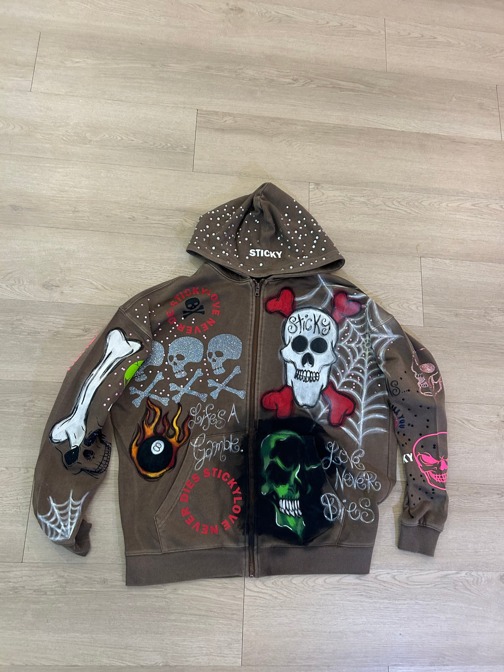 Sticky “Life’s A Gamble” Zip Up